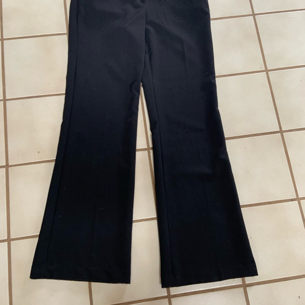 Women's black slacks.